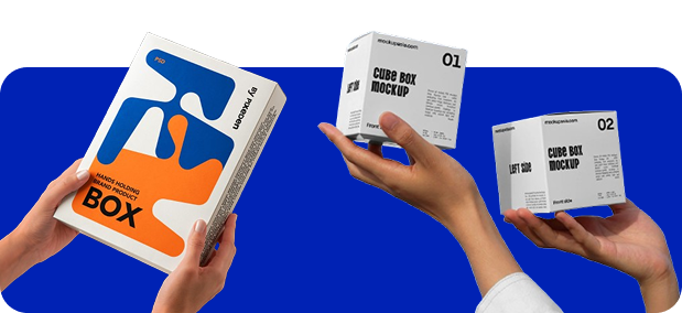 Hands holding printed boxes